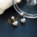 Women's heart-shaped Korean style stud earrings with artificial gemstones on electroplated alloy