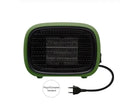 Green mini PTC ceramic heater showing compact size and metal mesh grille.