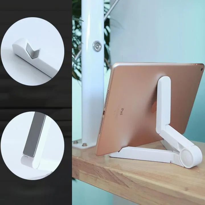 Black foldable tablet stand holding a smartphone in landscape mode on a desk, showing its compact folded size.
