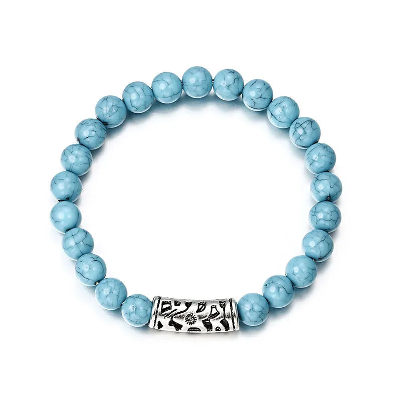 Classic acrylic blue beaded bracelet on wrist showing stretchy cord and smooth round beads