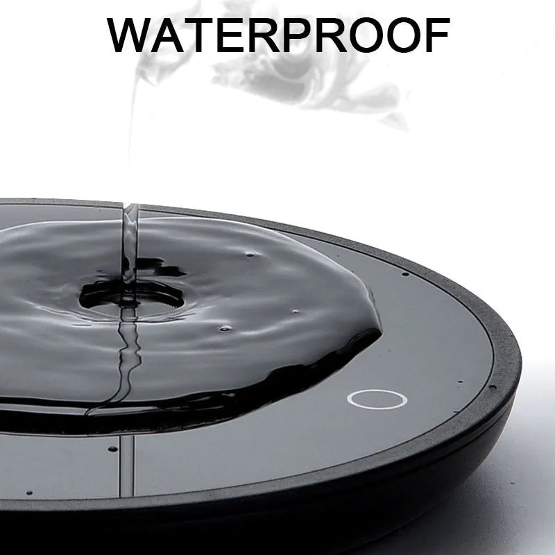 Black coffee mug warmer with 12cm diameter and temperature control switch