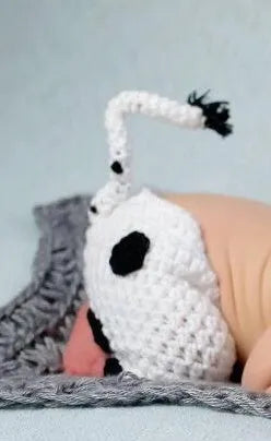 White hand knitted baby cow suit with hat and pants in wool and cotton