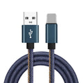 Cowboy-style denim USB-C charging cable with aluminium connectors in black, blue, or red.