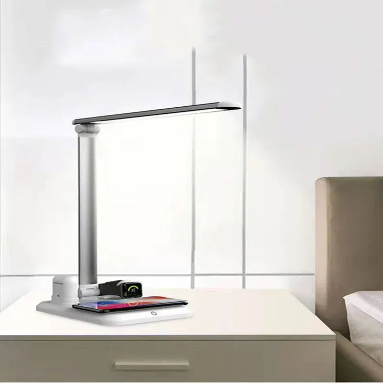 Black and white 4-in-1 LED desk lamp with integrated wireless charging pad and TYPE-C port.