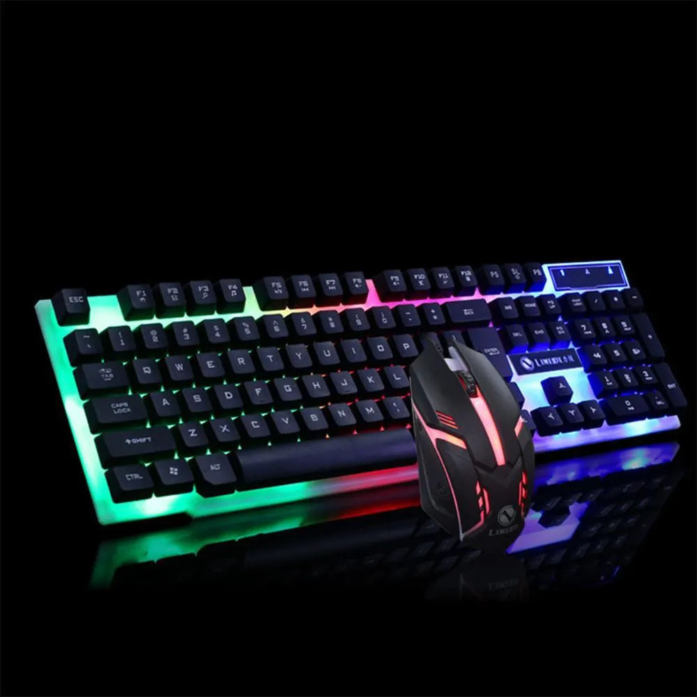 GTX300 black and white wired gaming keyboard and mouse set with coloured backlighting on a desk.