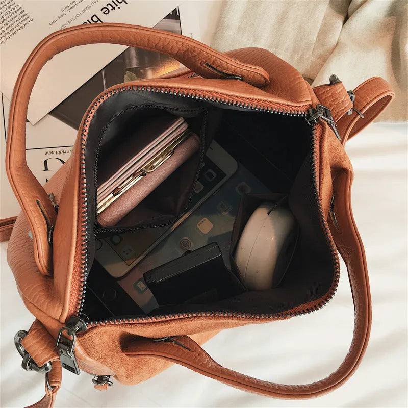 Soft PU casual tote shoulder bag for women in grey, showing large interior and zip closure.