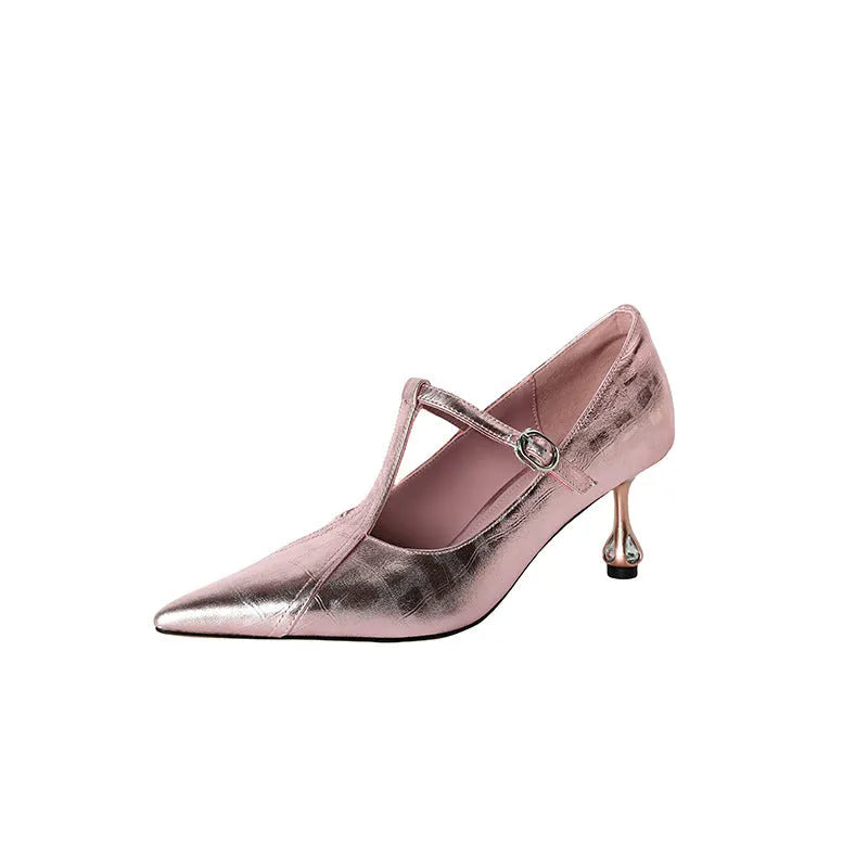 Women's gunmetal leather pointed-toe pumps with a low-cut front and chunky mid-height heel.