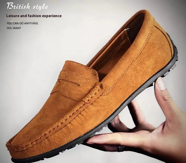 Men's suede leather Gommino loafer in brown, showing round toe and rubber sole.