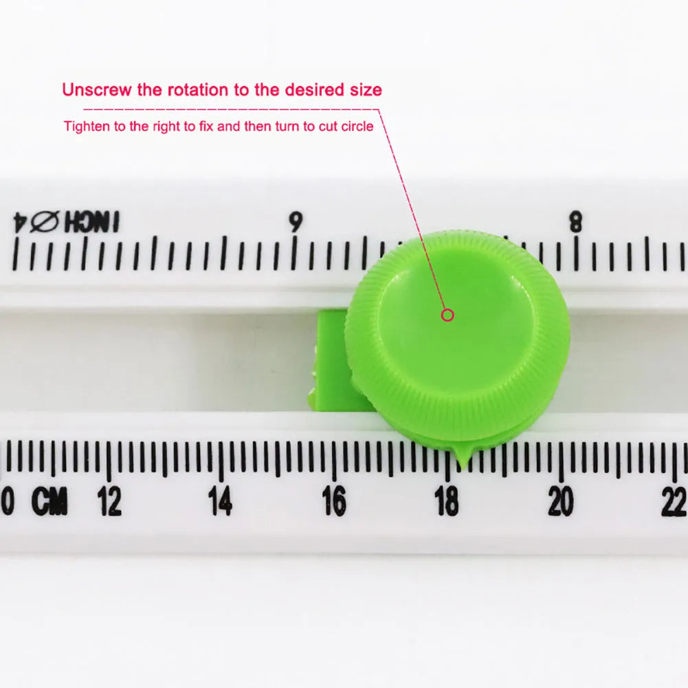Green or orange plastic round paper cutter for A3 paper on a colour box.