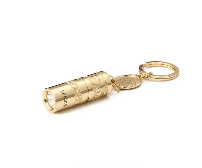 Gold zinc alloy waterproof mini LED flashlight on a keychain ring