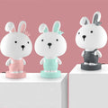 Cartoon animal table lamp with LED light and plastic shade in bear, cattle, rabbit, or tiger designs