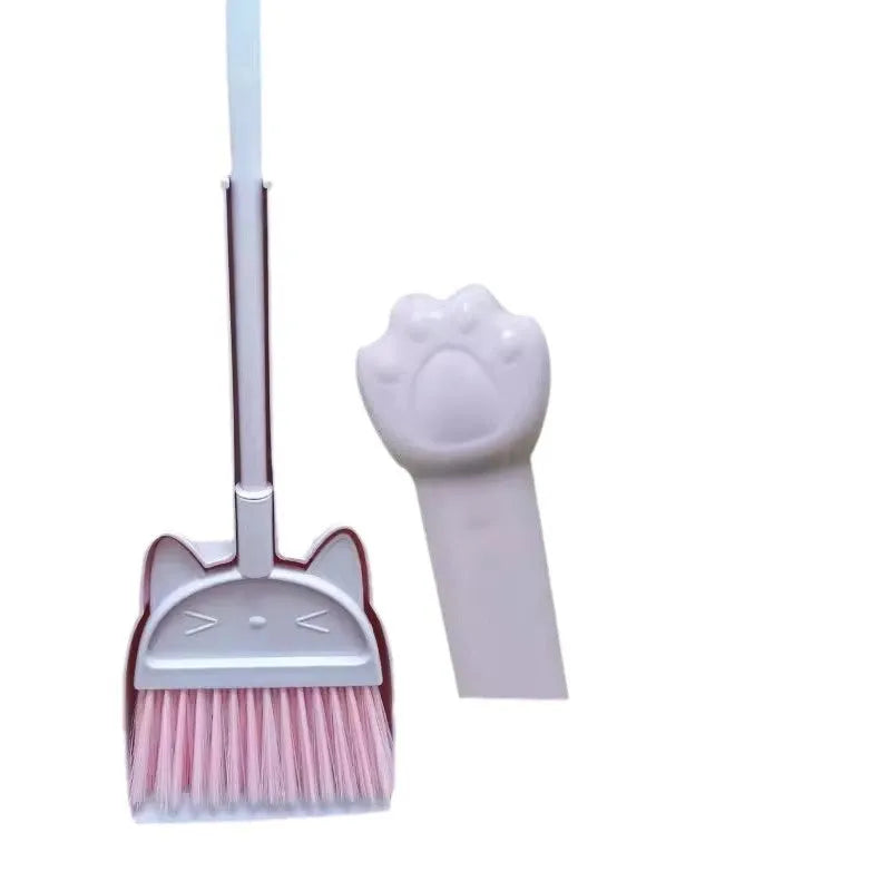 Purple plastic broom and dustpan set with rotating brush holder attachment