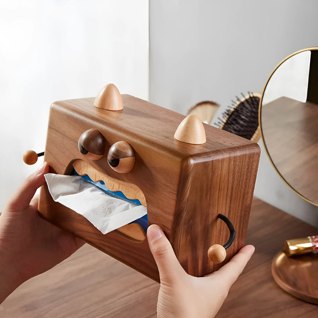 Wooden tissue box with cartoon monster design in beech and walnut colours