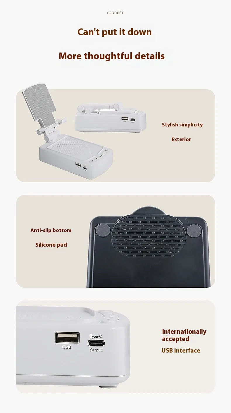 Multifunctional plastic tablet and phone holder with audio in black on a desk