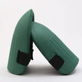 A pair of dense black EVA foam knee pads for gardening, showing size and thickness.