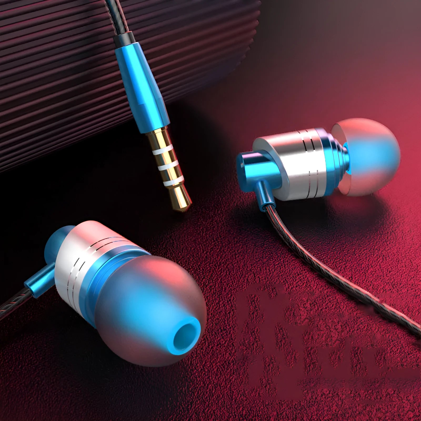 Black wired in-ear headphones with 3.5mm plug, microphone on cable, and silicone ear tips.