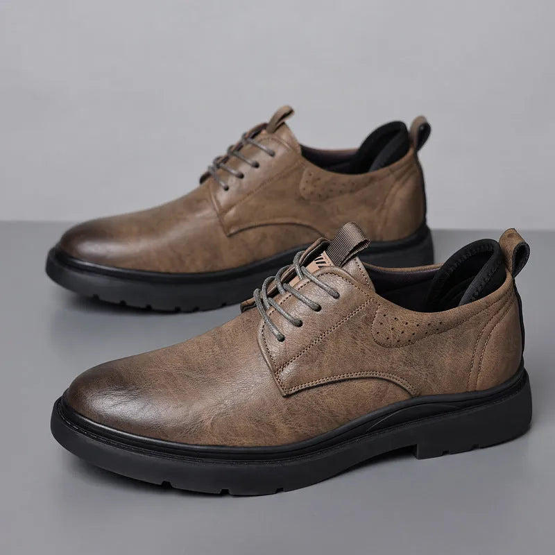 Men's black leather casual shoes with decorative sewing lines and rubber sole