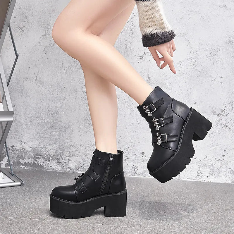 Black women's punk style Martin boots with a side zipper and thick heel.