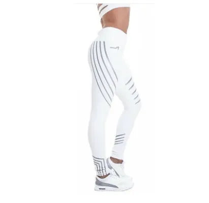 Women's black workout leggings with glowing print design and slim fit pencil pants silhouette