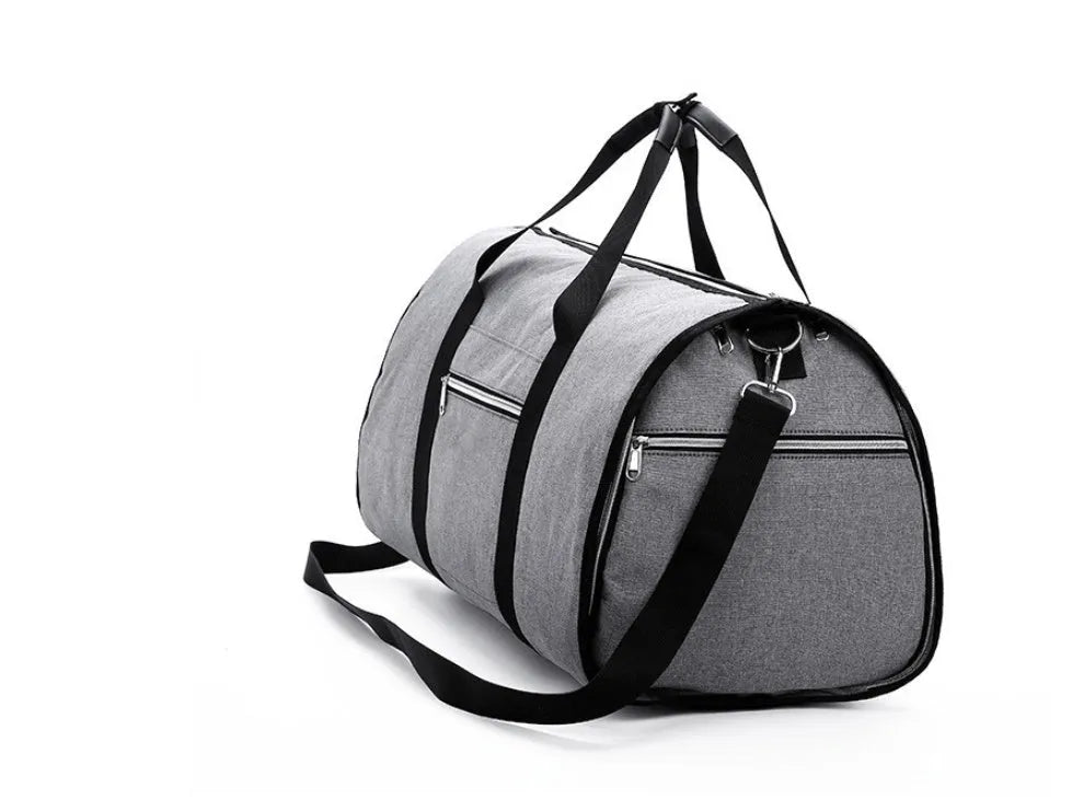 Medium-sized red cylinder travel bag with a zipper opening and carry handles.