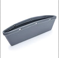 Car storage box in one of 5 colour options placed in a vehicle console for organising small items