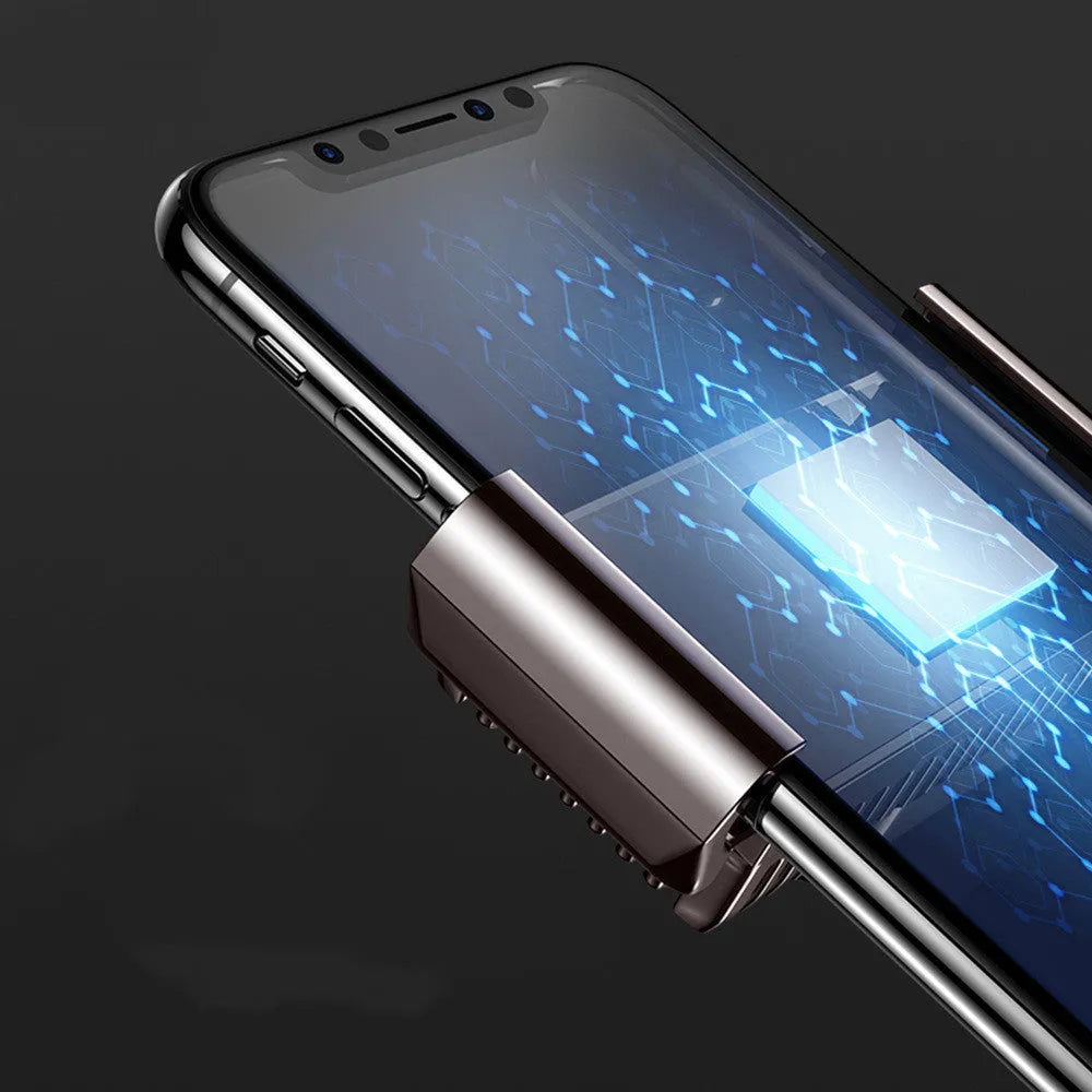 Black clip-on mobile phone radiator cooling fan attached to a smartphone, showing aluminium alloy and ceramic components.