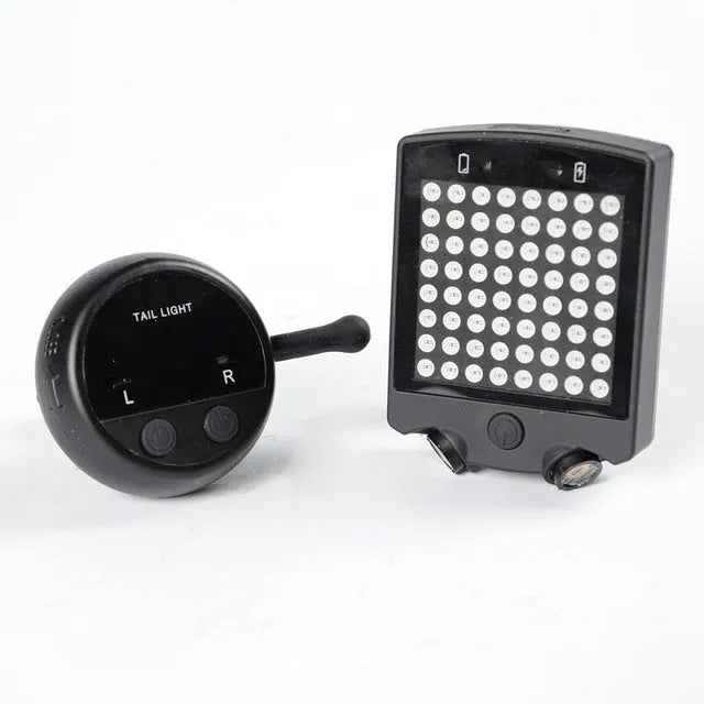 Black LED bicycle turn signal with wireless remote control, turn indicators, graphic tail light and laser parallel line