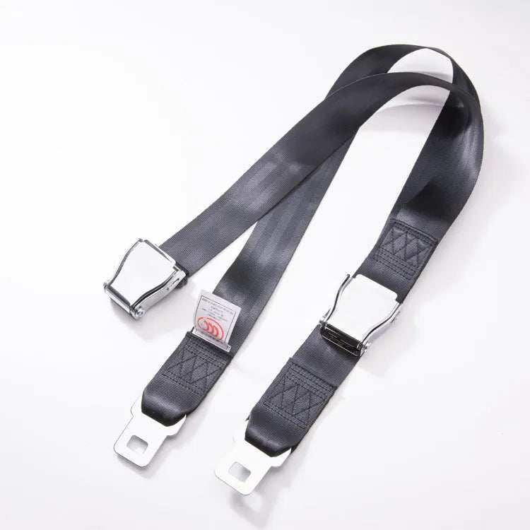 Black polyester pregnancy seat belt extender with double aircraft buckle installed on a car seat
