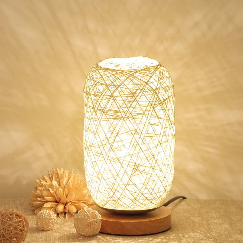 Brown hemp rope Sepak Takraw desk lamp with wooden base and USB cable.