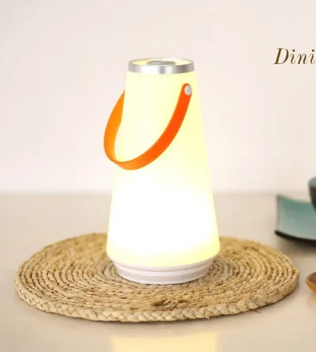 White rechargeable LED table lamp with square base and warm light illumination