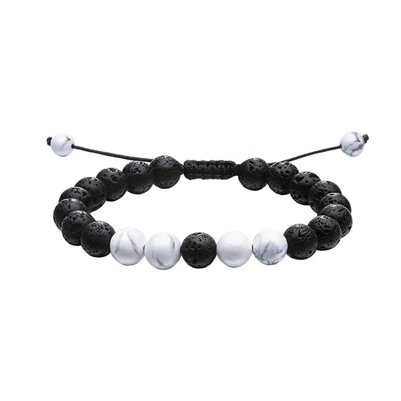 Matte black agate couple bracelets with geometric beads in individually packaged presentation