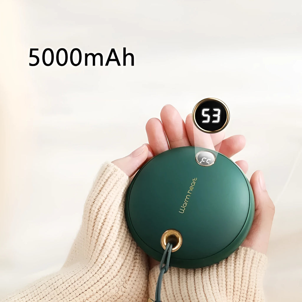 Green, pink, or white hand warmer power bank with digital display showing charge level