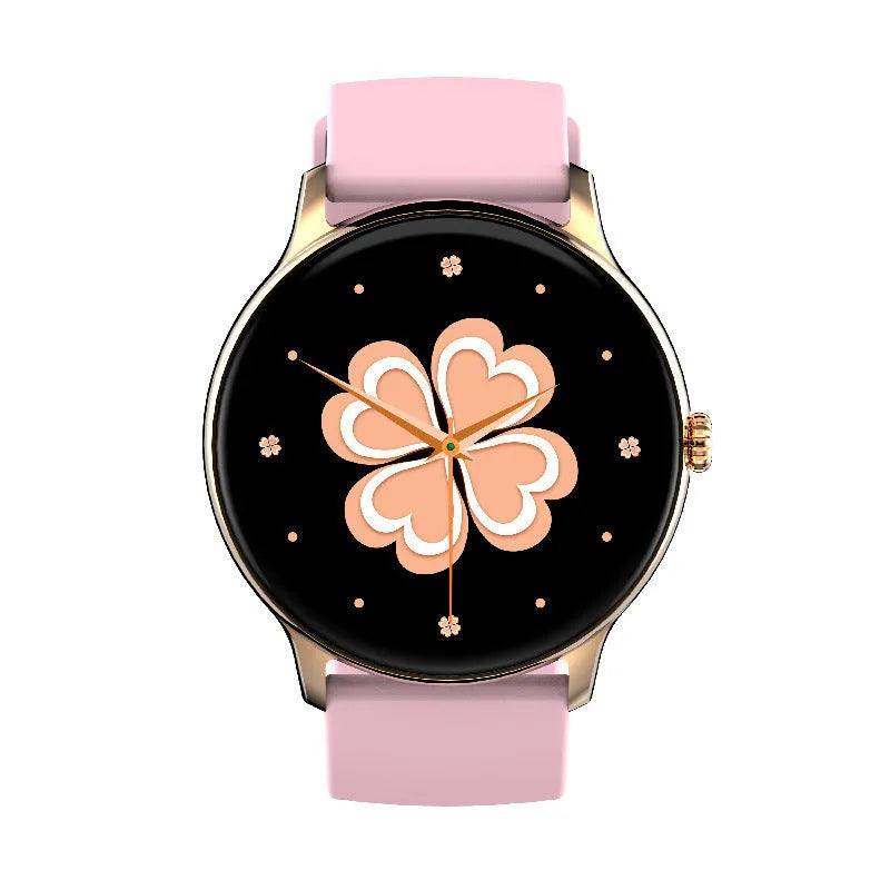Black blood pressure smart sports watch with silicone strap on a wrist, showing its 1.28-inch touchscreen display.