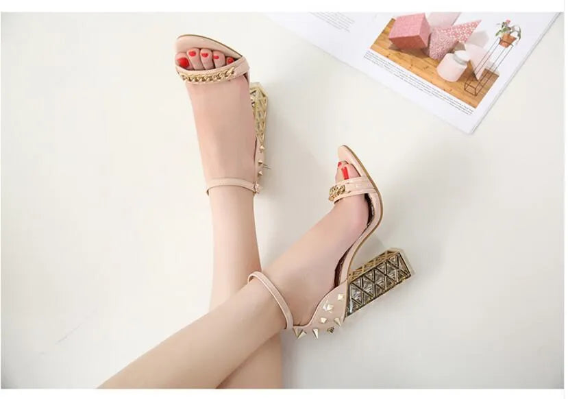Women's black suede toe chain sandals with buckle fastening and TPR sole on neutral background