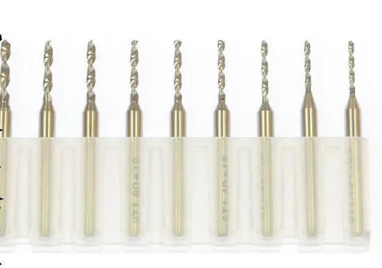 Close-up of a set of imported tungsten carbide micro-engraving bits in various sizes from 0.10mm to 2.00mm diameter.