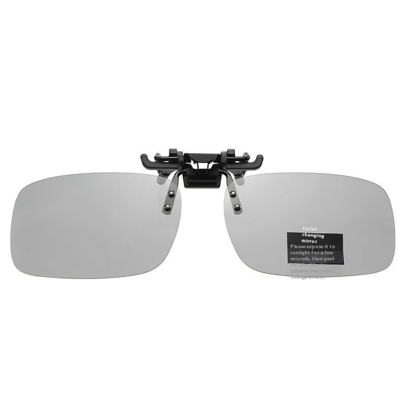 Transparent colourless resin polarised clip-on sunglasses with dual-purpose day and night modes for driving