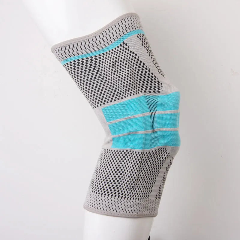 Sky blue silicone knee pad for running and basketball, made from elastic fibre.