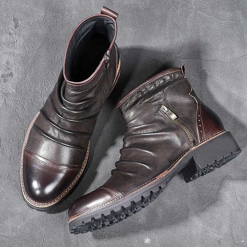 Black mid-calf cowboy boots with side zipper, round toe, and a medium horseshoe heel.