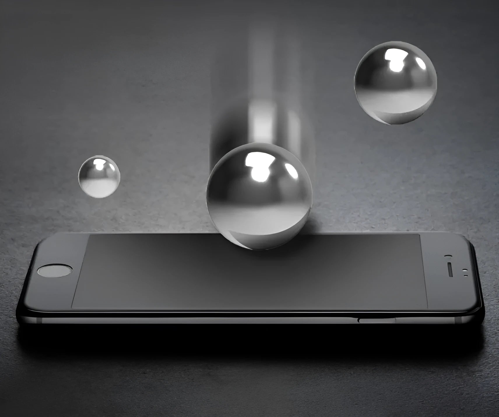 Tempered glass privacy screen protector for iPhone XS Max on a phone.