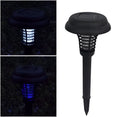 Black solar mosquito lamp with UV purple light and white light LEDs for garden insect control