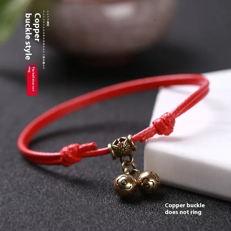 Nylon rope dog collar with a brass bell, shown in black, red, and coffee colour options.