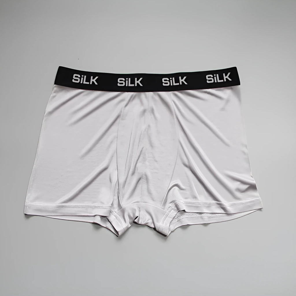 Men's navy blue silk shorts with loose fit and mid waist design