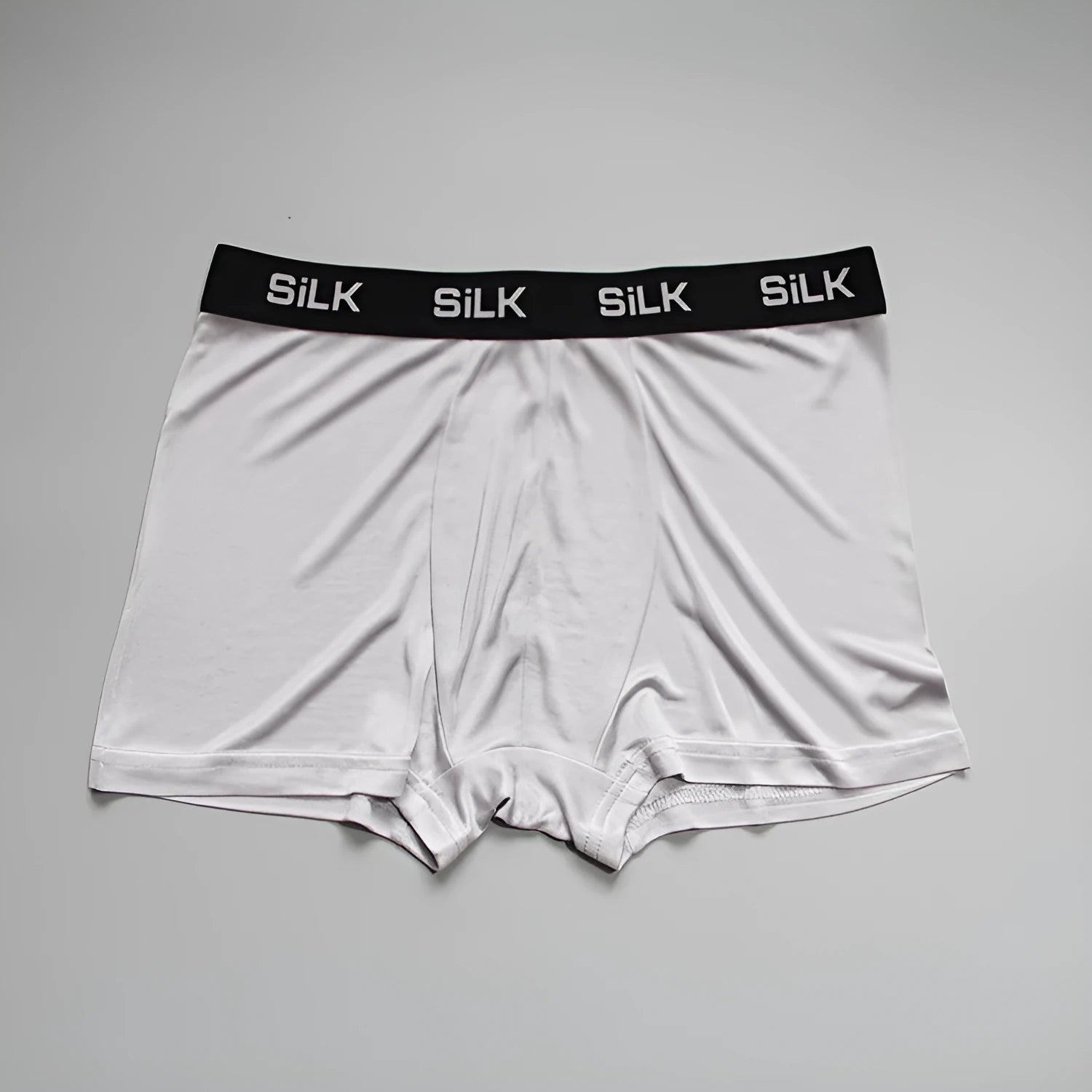 Men's navy blue silk shorts with loose fit and mid waist design