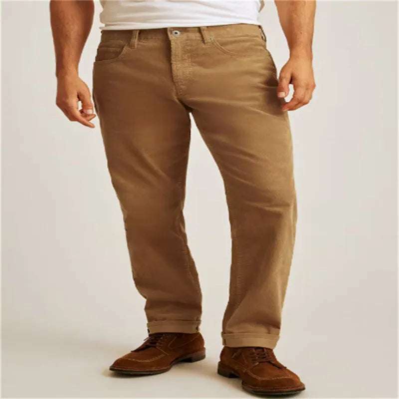 Straight leg corduroy casual trousers in army green colour showing mid waist and zip placket detail.