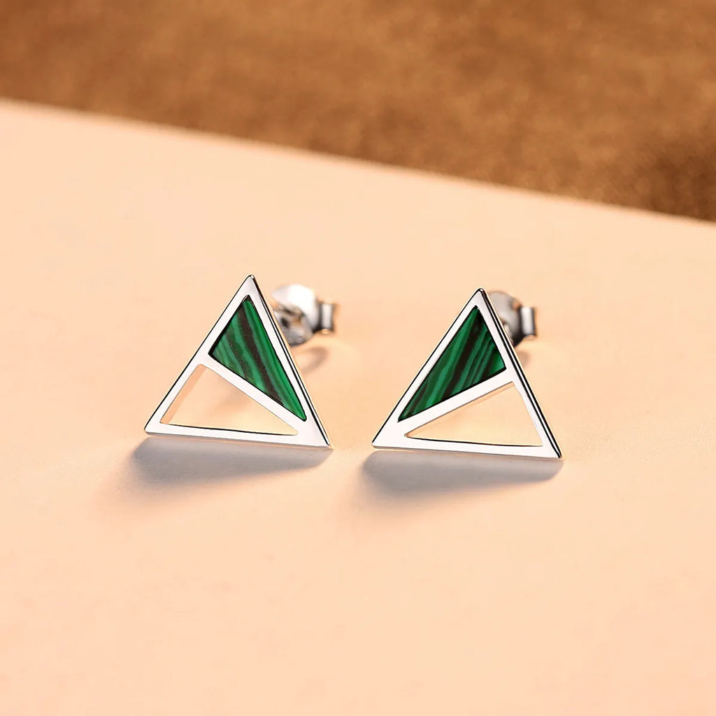 Green malachite stud earrings in silver with a geometric design and pure silver inlay gem setting