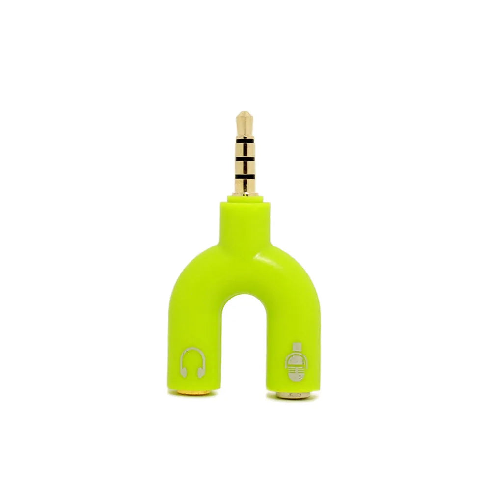 White 3.5mm audio splitter adapter with one male and two female gold-plated connectors on a dark background.