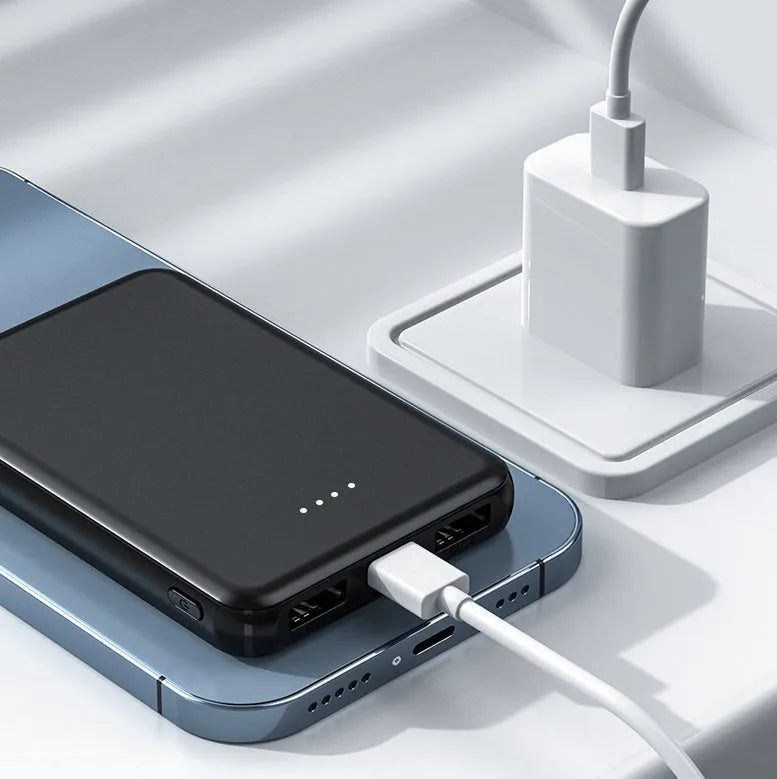 Black and white universal power bank for electric heating vests, showing compact size