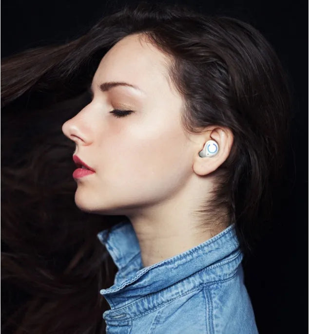 Black and white M18 true wireless in-ear stereo headset with Bluetooth 5.0.