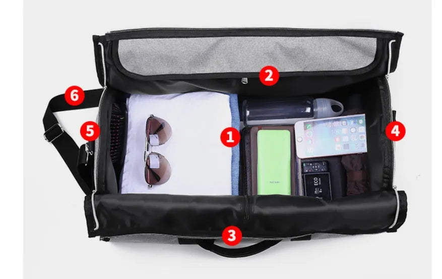 Medium-sized red cylinder travel bag with a zipper opening and carry handles.
