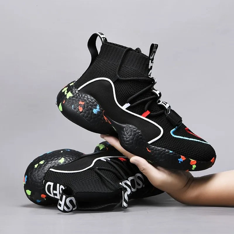 Men's camouflage pattern sneakers with mesh upper and flat vulcanised rubber sole.